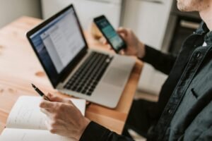 Person using productivity and wellbeing apps on a laptop and smartphone, demonstrating how digital tools can improve both work efficiency and mental health.

Title: Productivity and Wellbeing Apps | CalmTech-Life.com