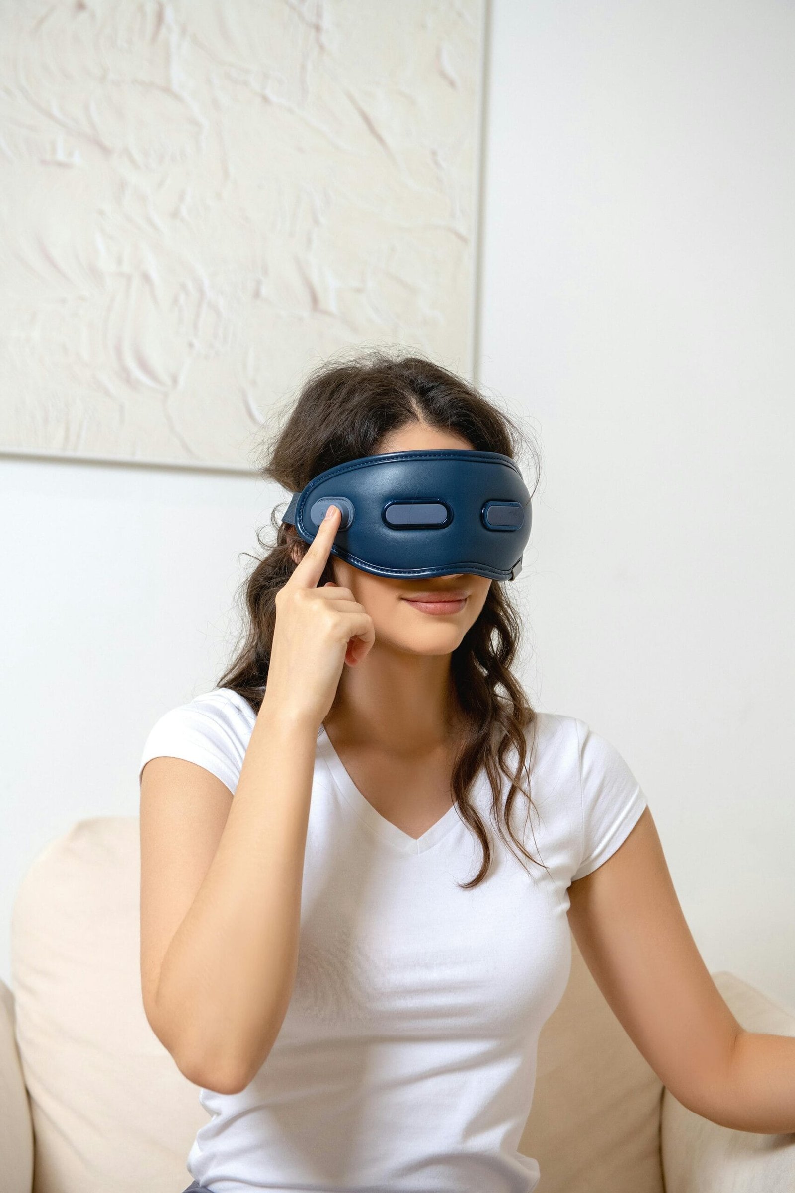 Person using a VR headset for holistic wellbeing, showcasing the use of technology for relaxation and mental health improvement.